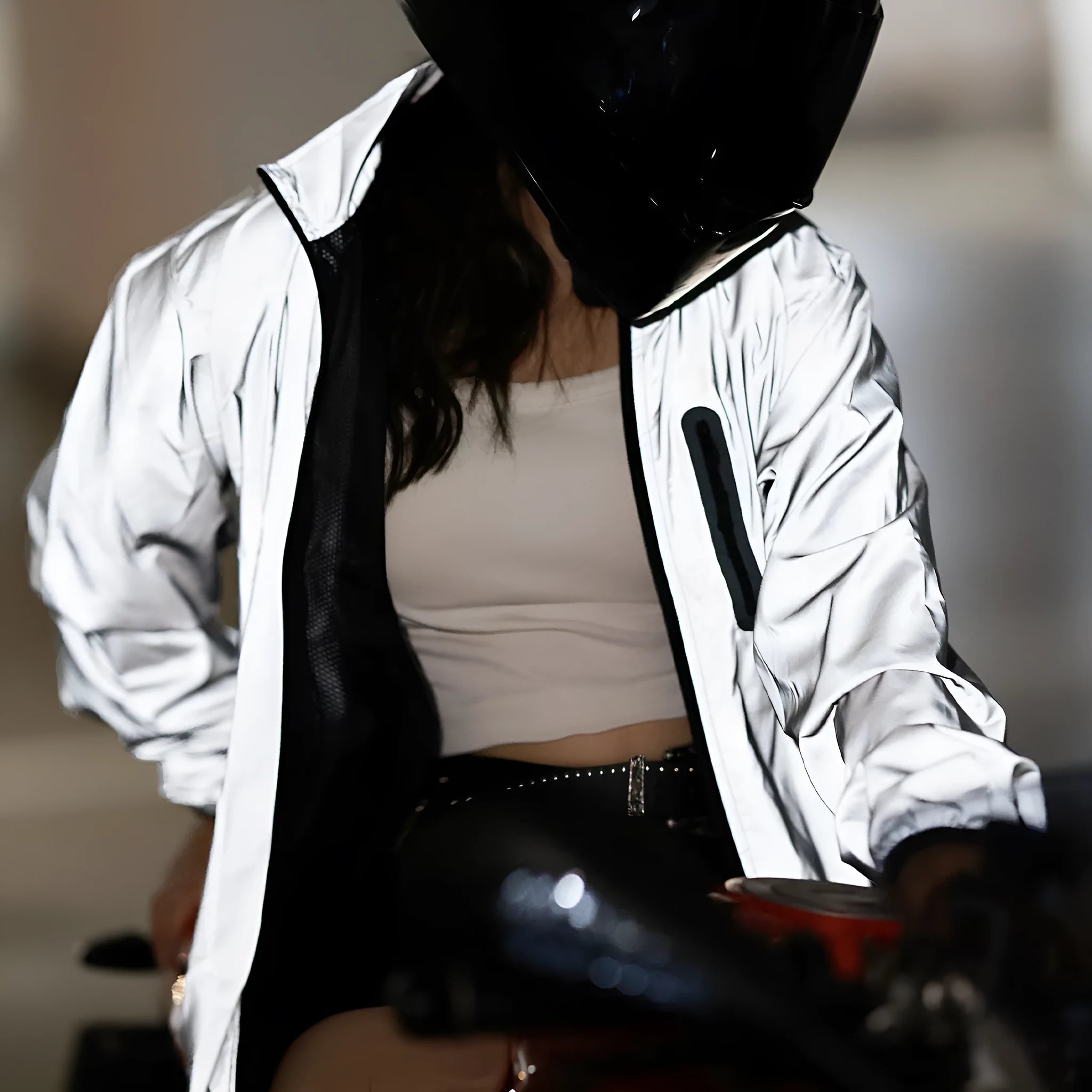 Silver long-sleeved waterproof polyester windproof jacket on a hanger.