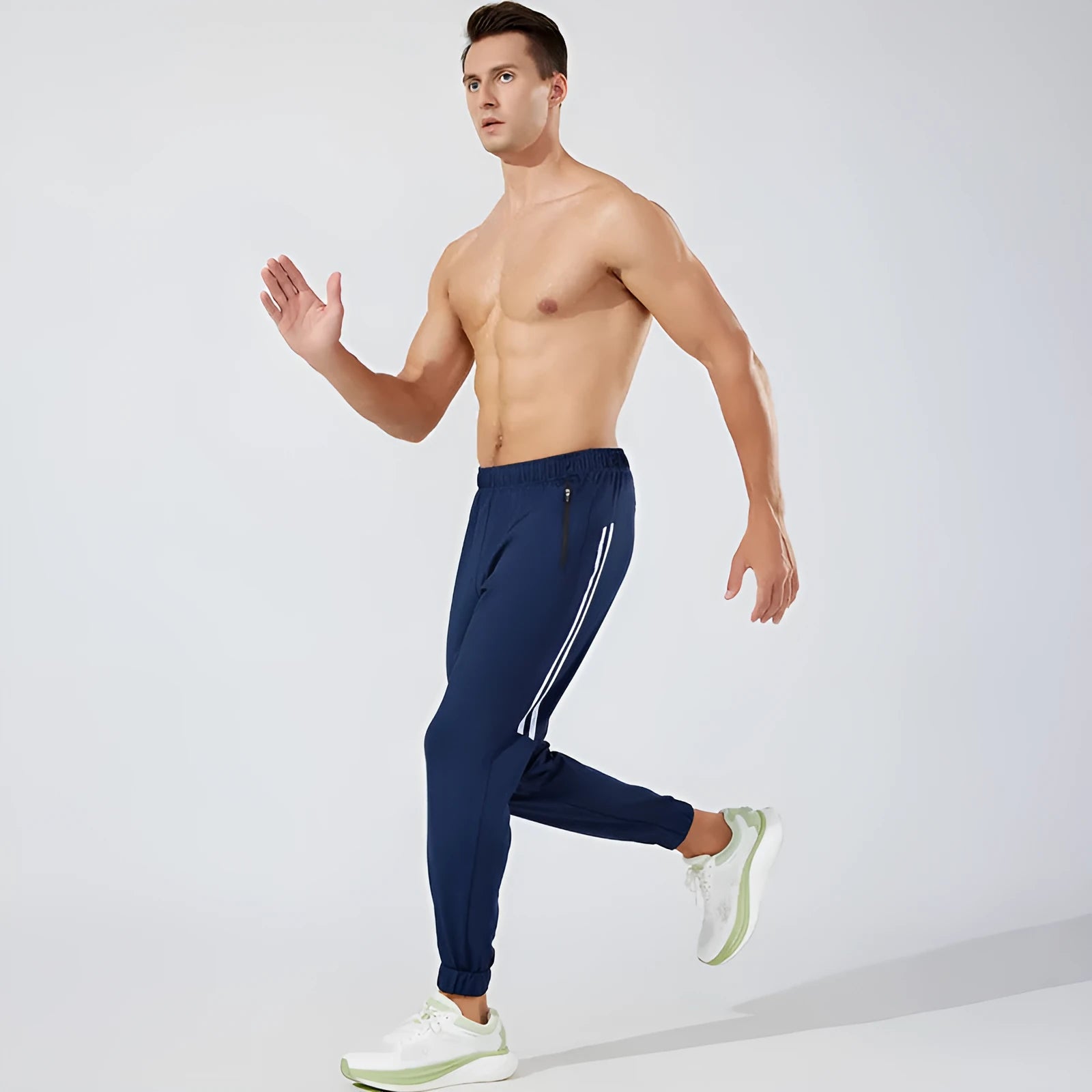 Men's black running trousers with mid waist fit and breathable polyester construction