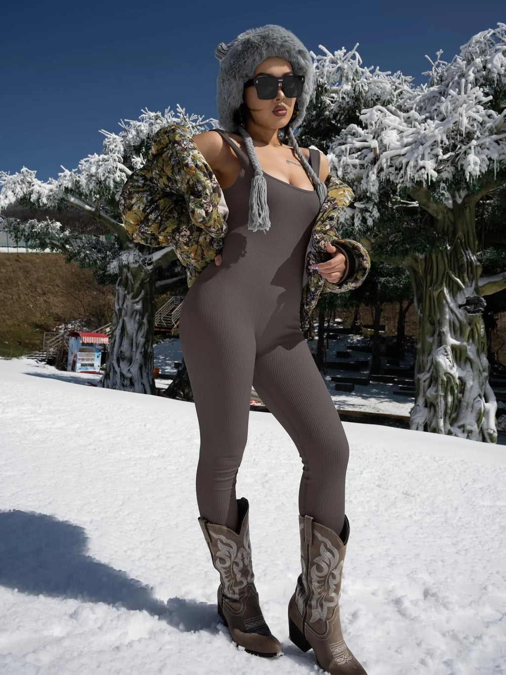Women's long sleeve suspender tights bodysuit in beige, showing button detail and waist-defining fit.
