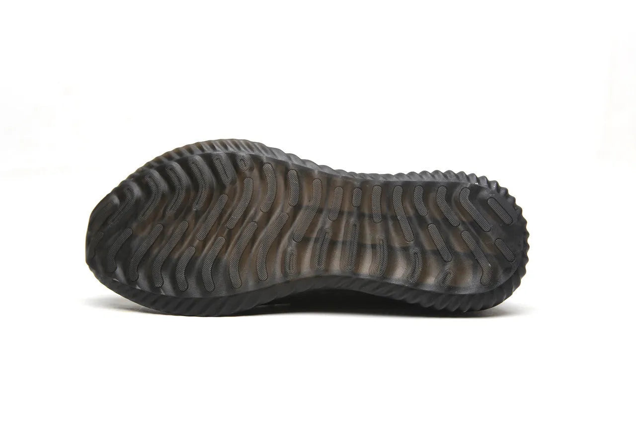 Steel toe cap safety work shoes in black with low-cut design, shown on a work site background.