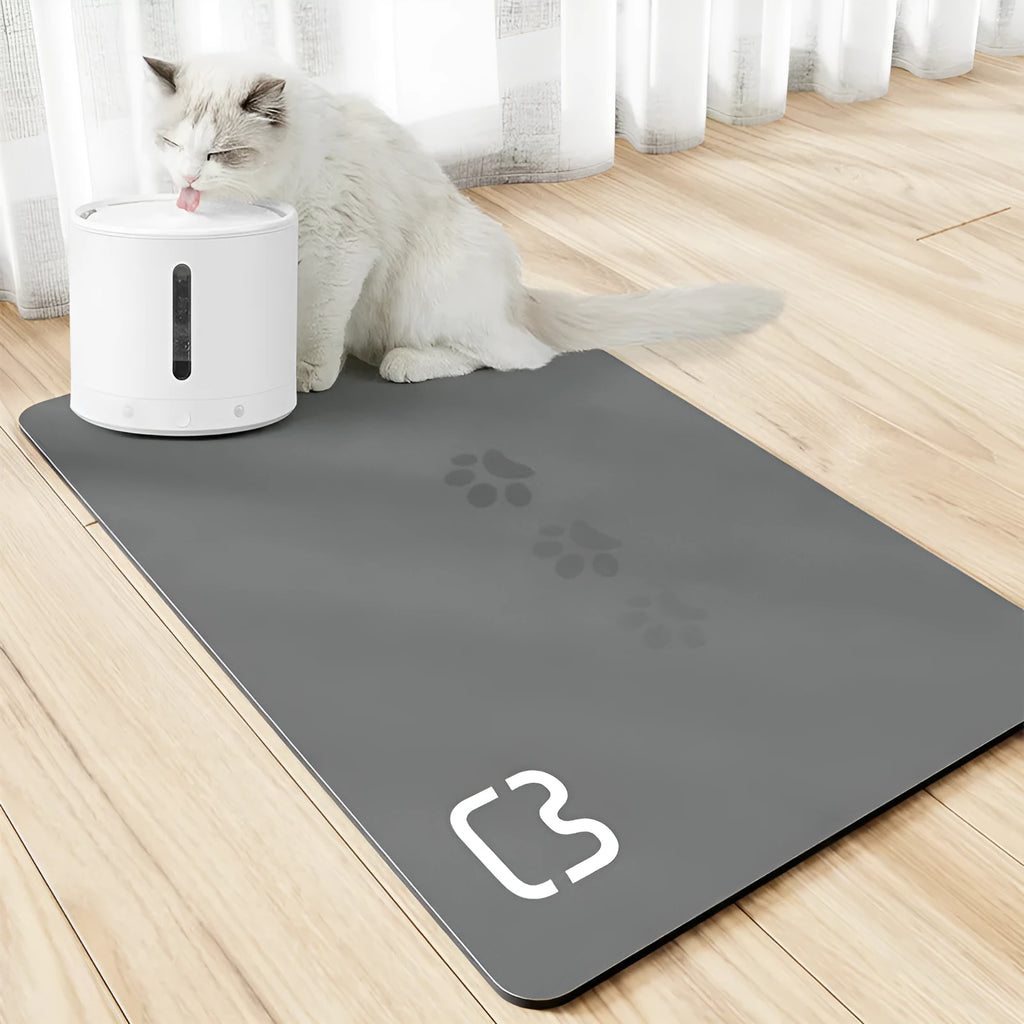Minimalist pet feeding mat in dark gray with cat head pattern, non-slip and water-absorbing, 35x50cm
