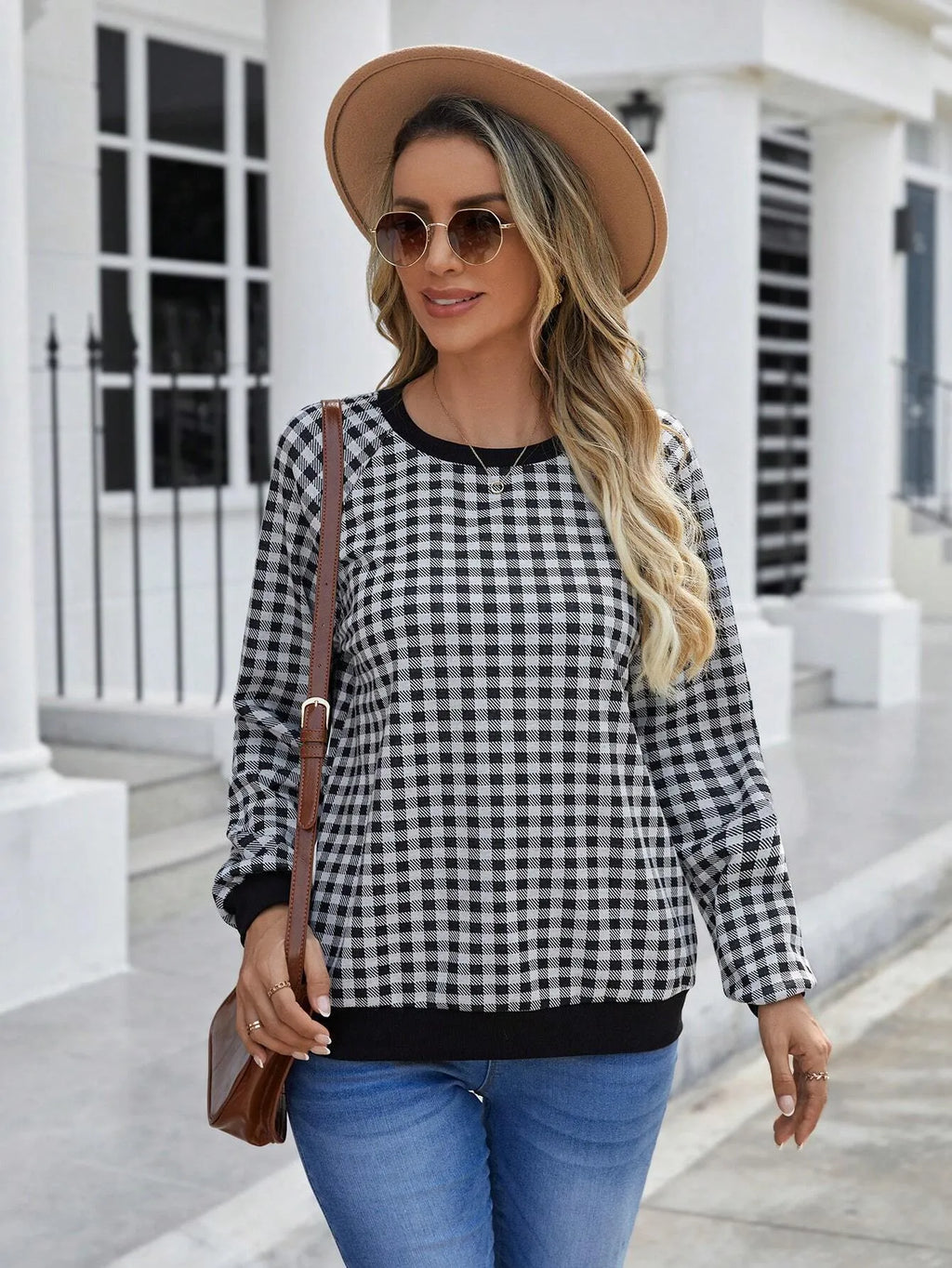Black long sleeve pullover sweater with a printed Japanese plaid pattern
