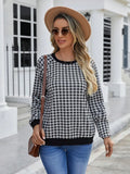 Black long sleeve pullover sweater with a printed Japanese plaid pattern