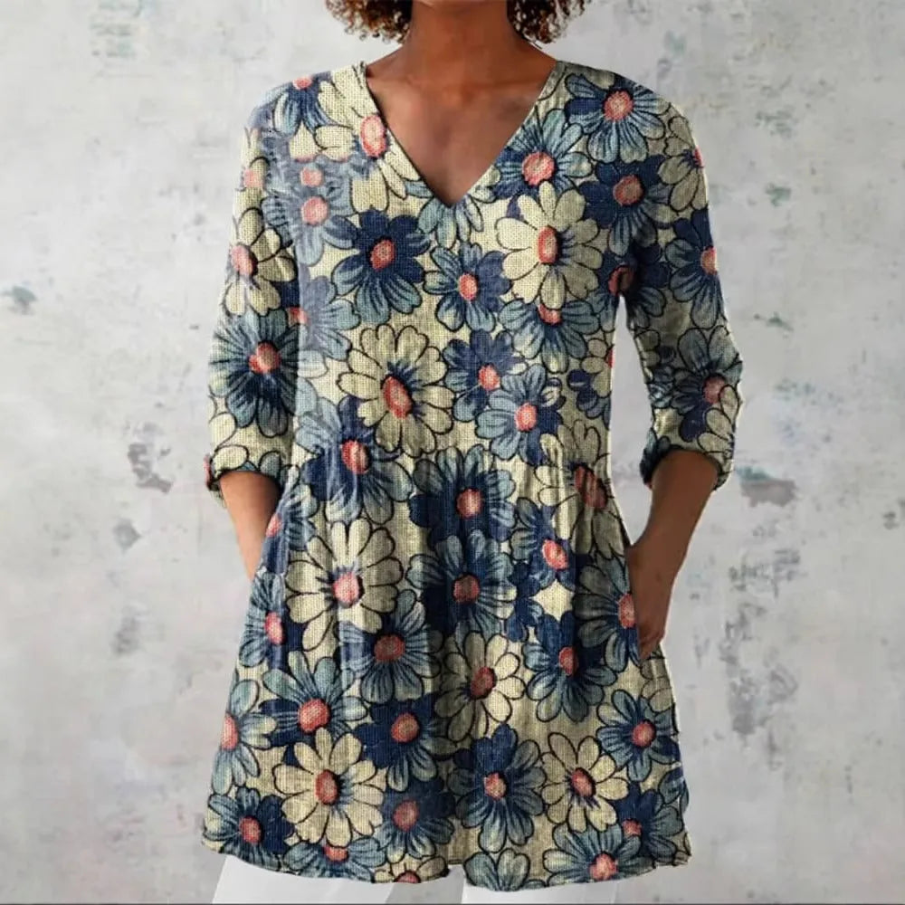 Women's retro slim fit printed long-sleeved top in a floral pattern, showing front view.