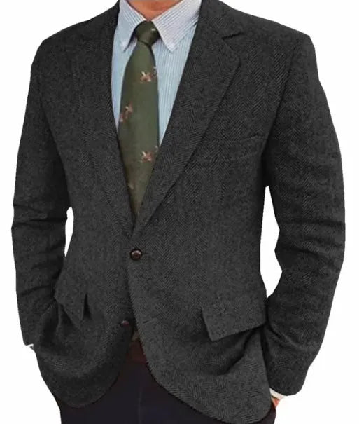 Men's brown herringbone pattern retro suit jacket with long sleeves on a hanger.