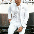 White slim-fit two-piece men's suit for weddings, shown on a hanger.