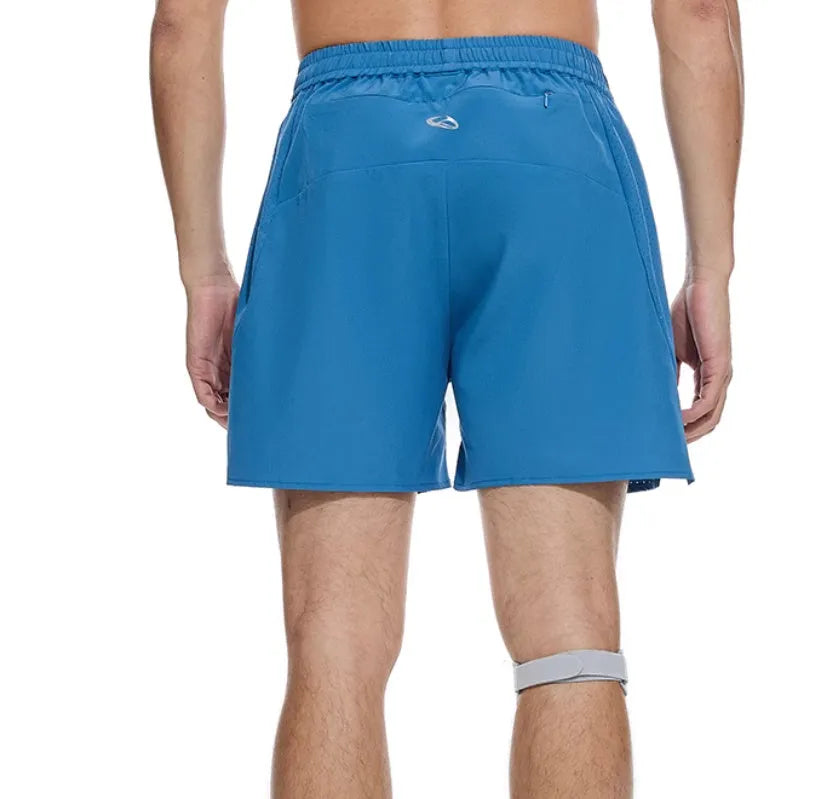 Black running shorts with laser-punched stitching and four-sided stretch fabric laid flat.