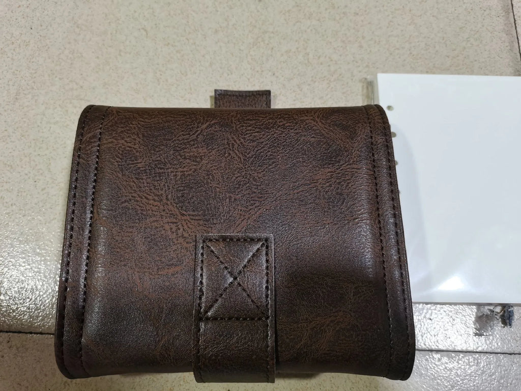 Brown retro-style A7 notebook with a leather buckle design and loose-leaf binding