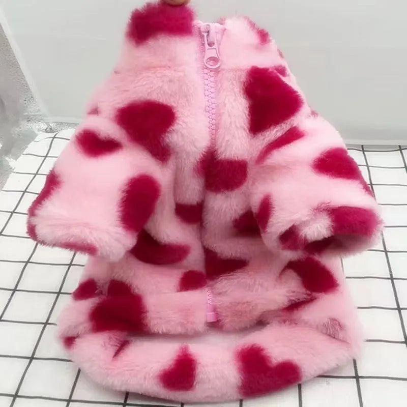 A pink polyester plush warm coat for a small dog, shown on a mannequin.