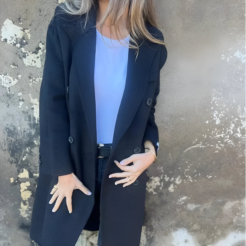 Women's mid-length lapel double-breasted long sleeve jacket in solid colour polyester, loose fit, front view