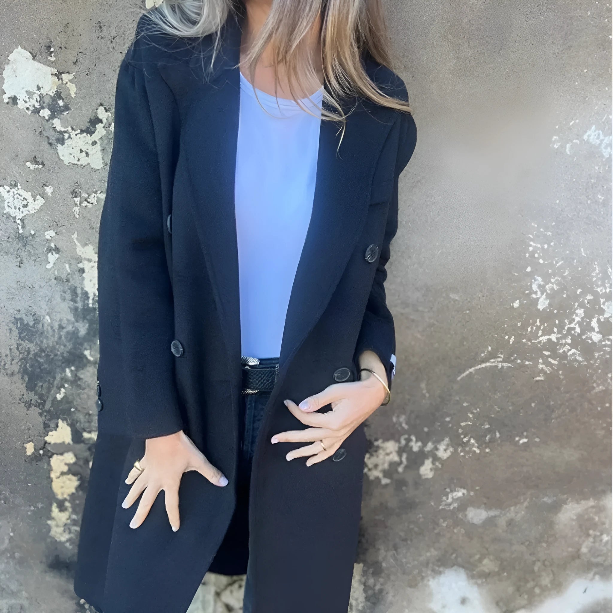 Women's mid-length lapel double-breasted long sleeve jacket in solid colour polyester, loose fit, front view