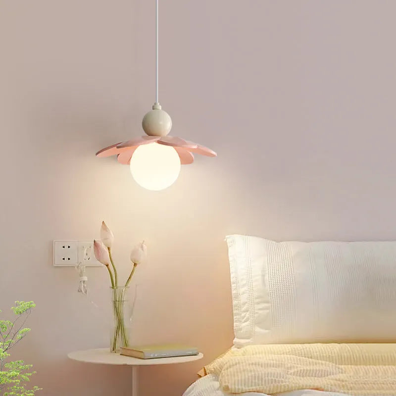 Modern minimalist cream bedside chandelier with pink finish and full spectrum light option for bedroom