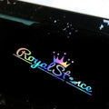 Large reflective crown-shaped car sticker on a vehicle window, showing black, white and colour options.