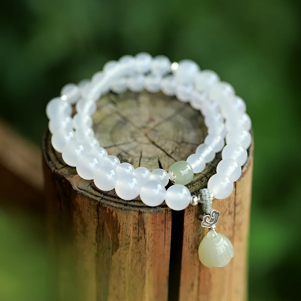 Women's S925 silver bracelet with white agate and Hetian jade stones in geometric lotus design