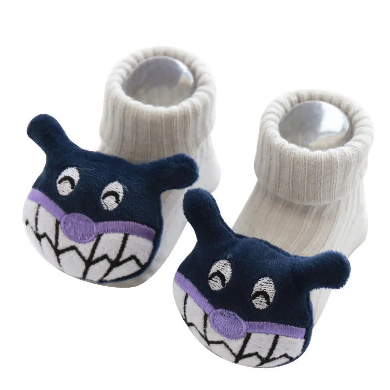 Cotton baby floor socks in various colours and patterns including bows, stars, and animal designs
