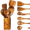 Seven-piece wooden kitchen utensil set with spoons and spatulas in natural finish