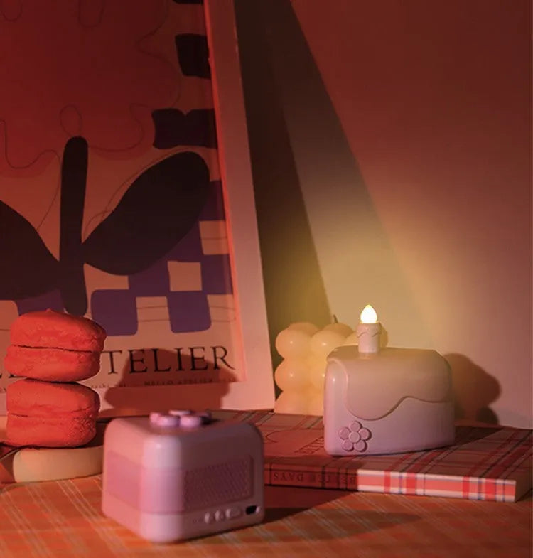 Maktoub Split Ring Cake Bluetooth Speaker in Pink and Violet colours, silicone and ABS build, creative gift for couples