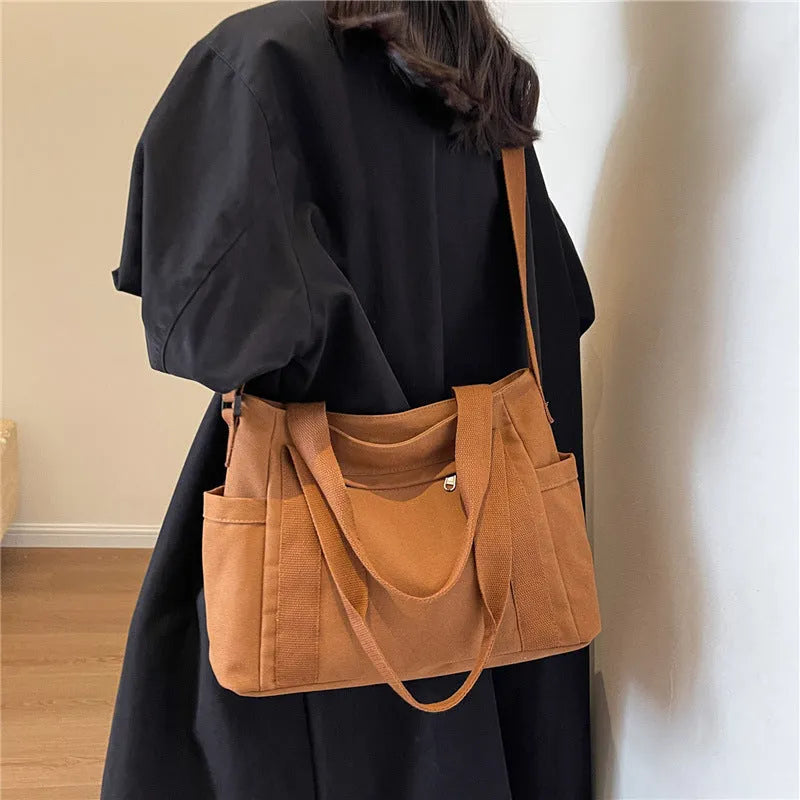 Large capacity polyester shoulder tote bag for women in solid colours with mobile phone pocket