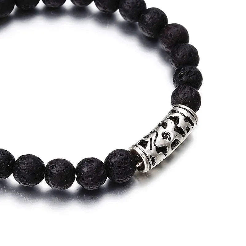 Classic acrylic blue beaded bracelet on wrist showing stretchy cord and smooth round beads