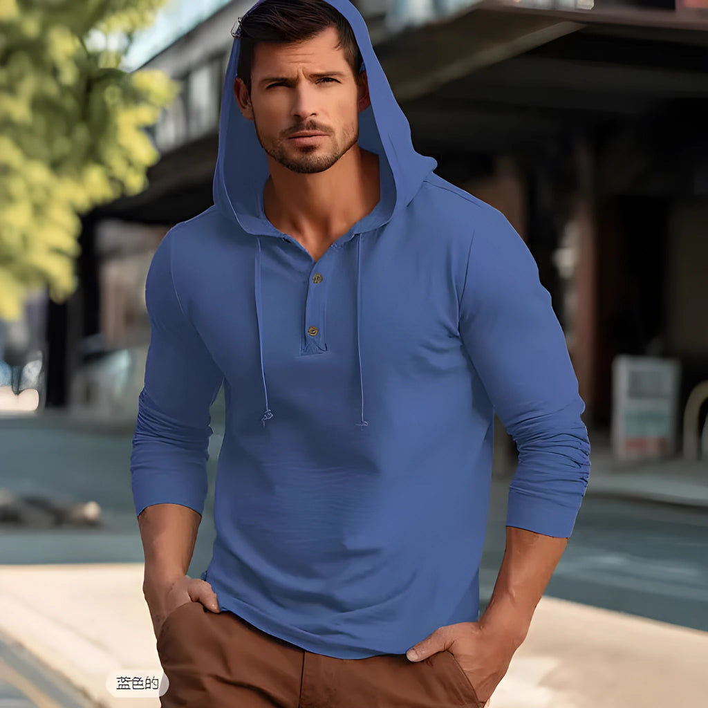 Men's dark blue cotton hoodie pullover with long sleeves on a hanger