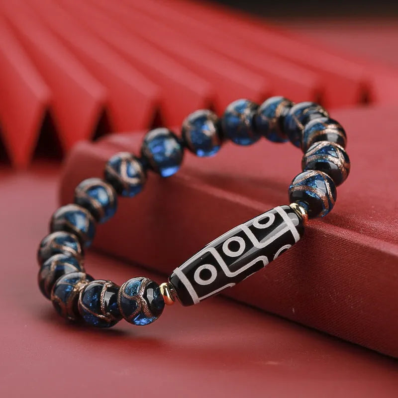 Handmade coloured glaze bracelet with auspicious patterns and year snake motif in Chinese style