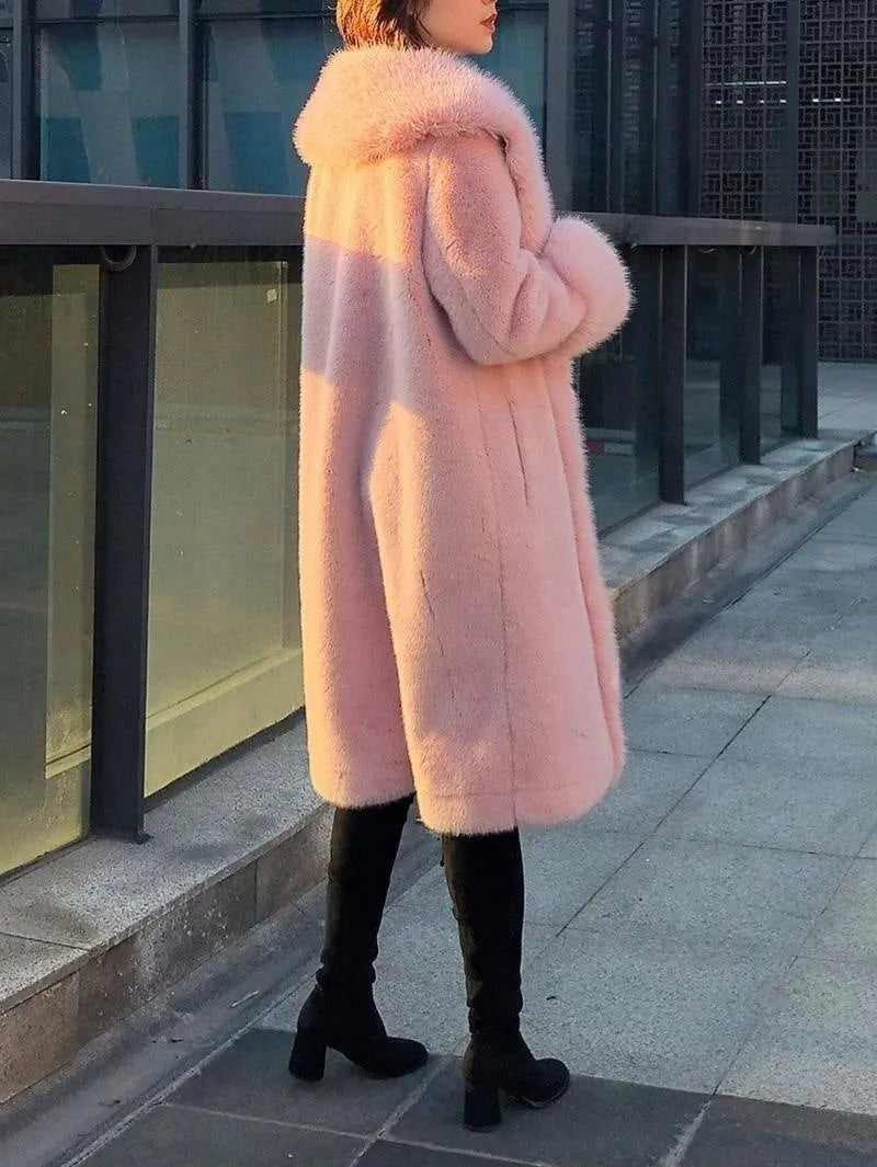 Women's grey thick faux rabbit fur mid-length coat with fur collar on a hanger