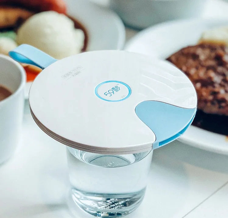 Blue USB-powered baby bottle steriliser showing slim 11.8mm profile with gravity-sensing technology