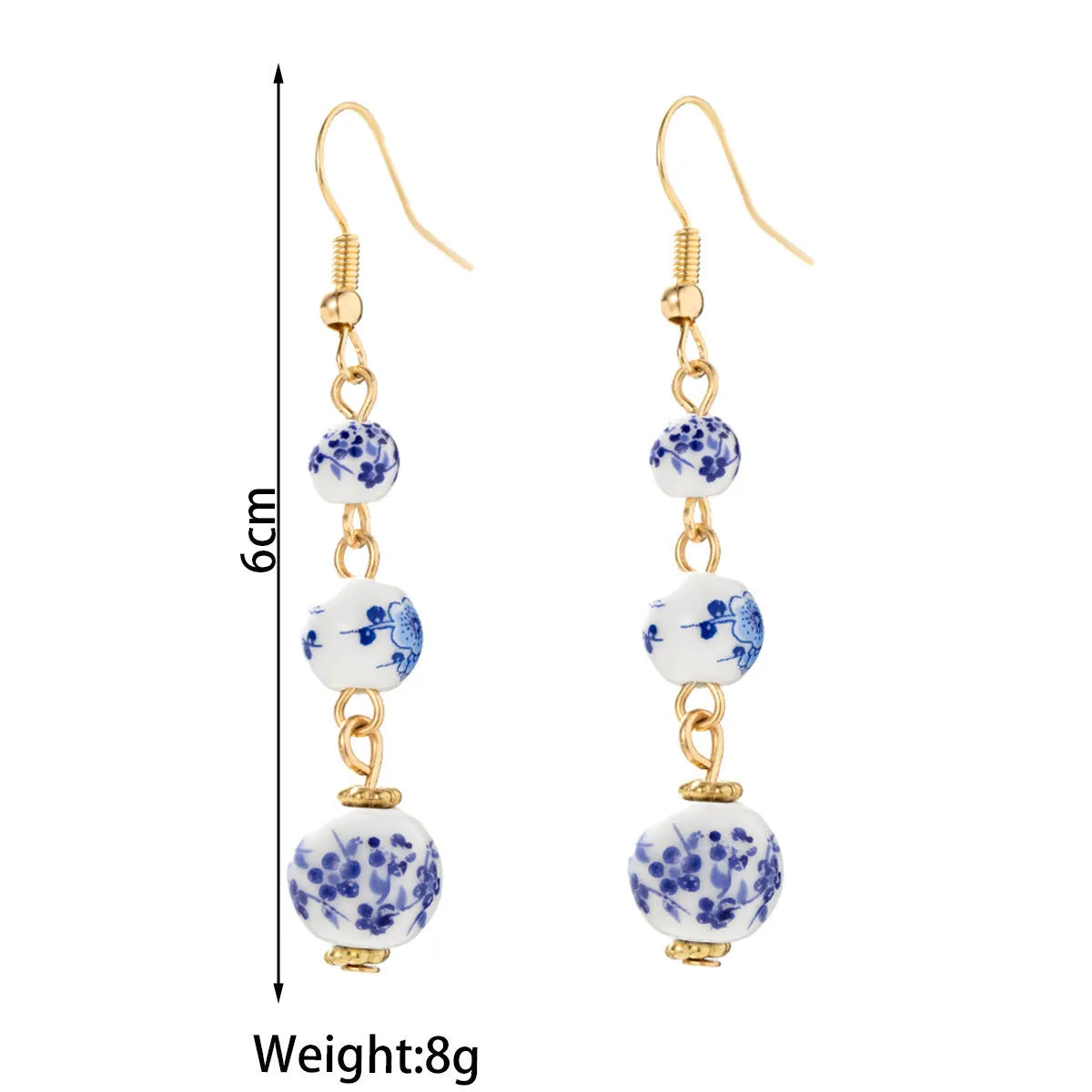 Long retro earrings with blue and white ceramic beads and geometric alloy parts.