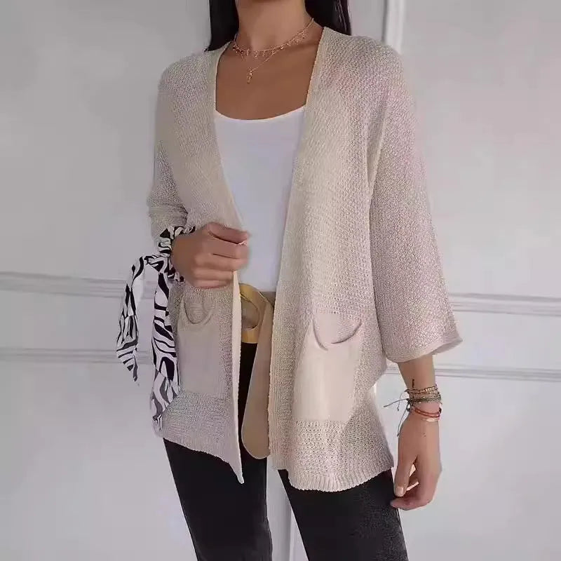 Women's waffle pattern cardigan coat in army green with nine-quarter sleeves and pocket details