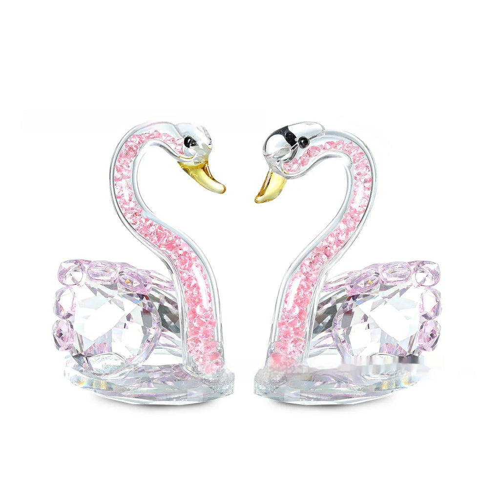 Modern white crystal swan decoration on a desk, available in red, blue, pink, and purple.