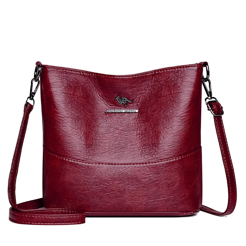 Women's soft leather shoulder bucket bag in black, wine red, or ginger yellow with mobile phone pocket