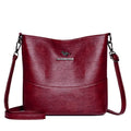 Women's soft leather shoulder bucket bag in black, wine red, or ginger yellow with mobile phone pocket