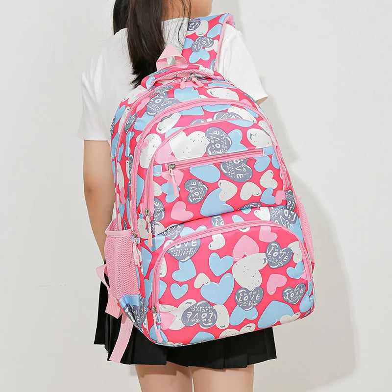 Large blue student backpack with air pillow belts on the back straps.