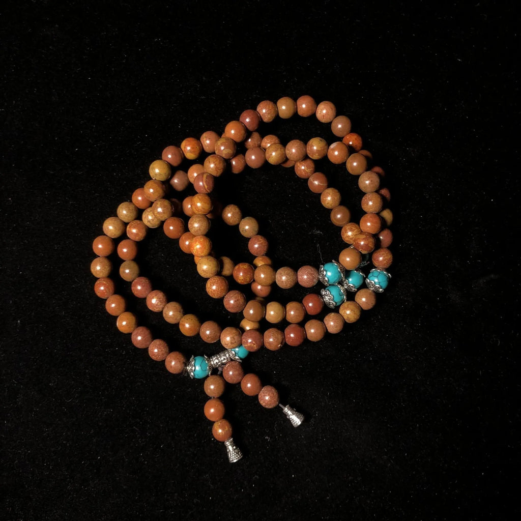 108-bead stone bracelet with hand-polished geometric lvzhu beads