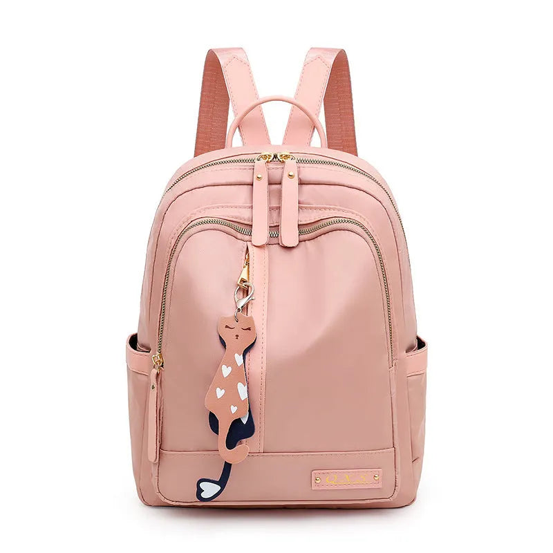 Women's soft nylon casual backpack in black colour with double shoulder straps and external pockets