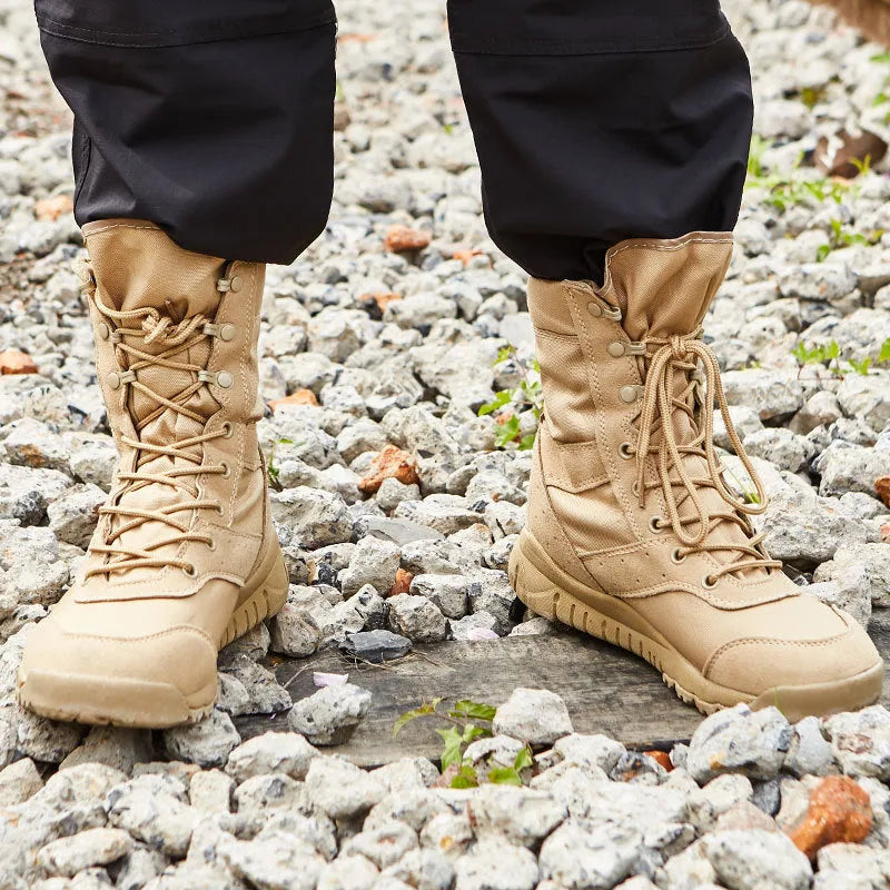 Black and sand coloured Yulong tactical desert combat boots for outdoor climbing and sports.