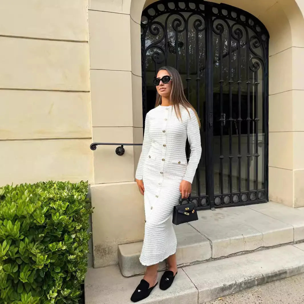 French retro slim fit knitted dress with button front and long sleeves in black or white