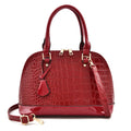 Large shiny black PU leather crossbody shoulder bag with a shell shape.