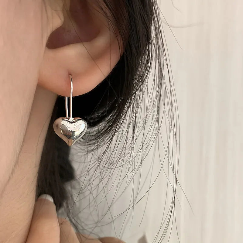 Korean style glossy heart-shaped copper earrings with silver finish for women
