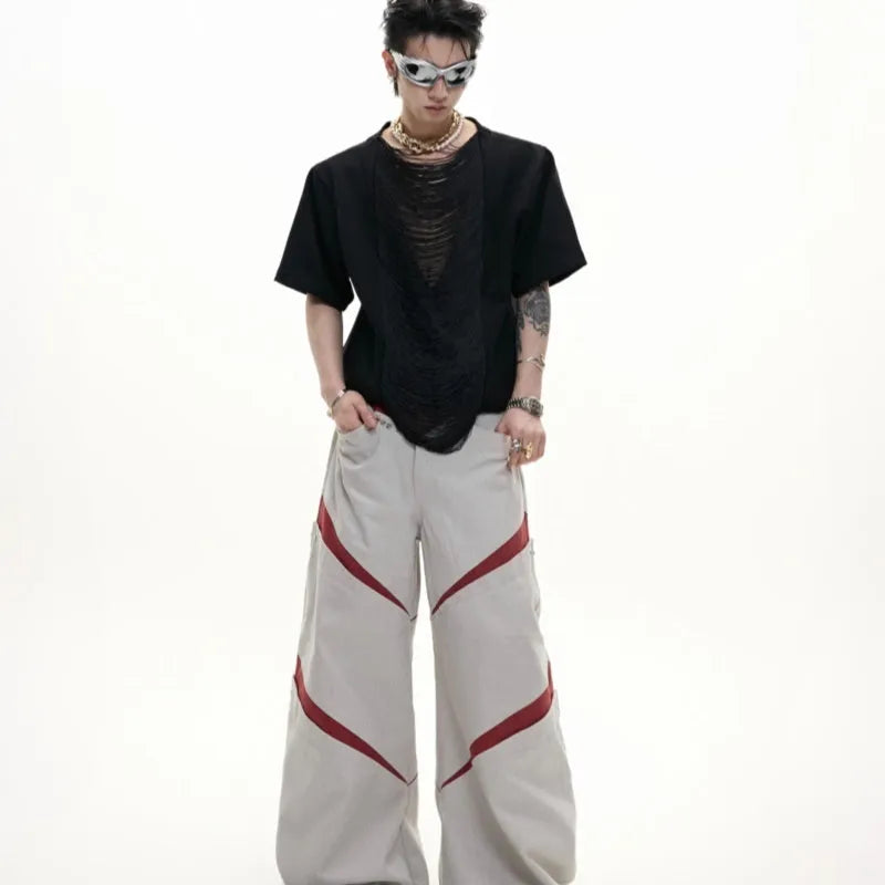 Drum black loose-fit men's V-neck short sleeve t-shirt with tassel detail on the collar.