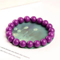 Purple mica crystal bracelet with polished finish showing single circle design in one of three available sizes