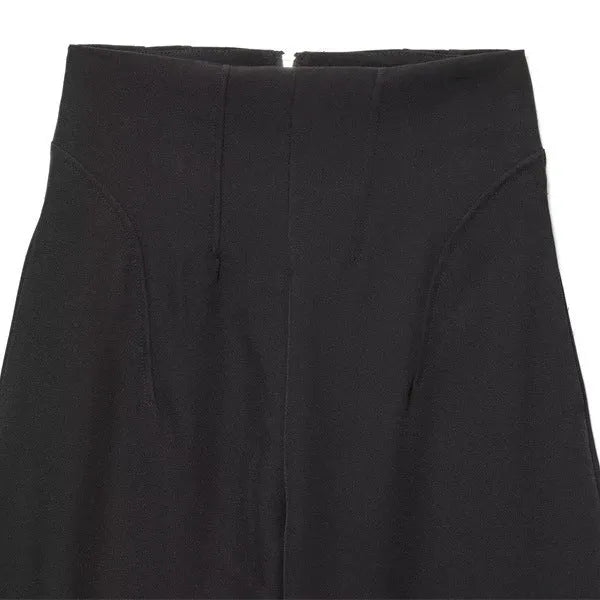 Women's black nylon high-waist zip-front straight-leg trousers on model