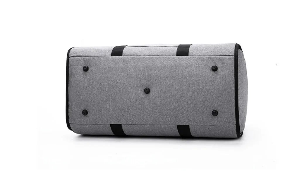 Medium cylinder travel bag in Oxford cloth, shown in black, with zipper opening and cylindrical shape.