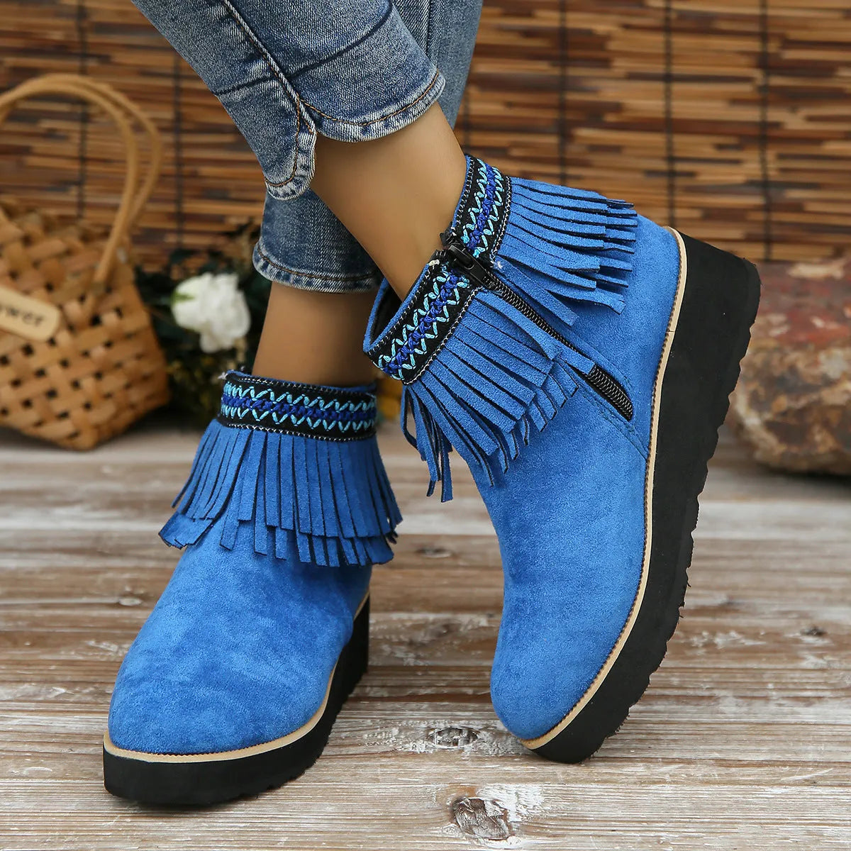 Women's dark brown suede wedge ankle boots with side zip and decorative tassel.