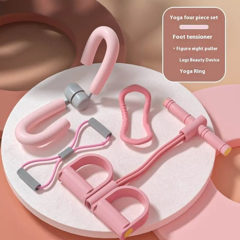 Yoga four piece fitness set showing leg beauty device, yoga ring, pedal tension device and eight character tension rope