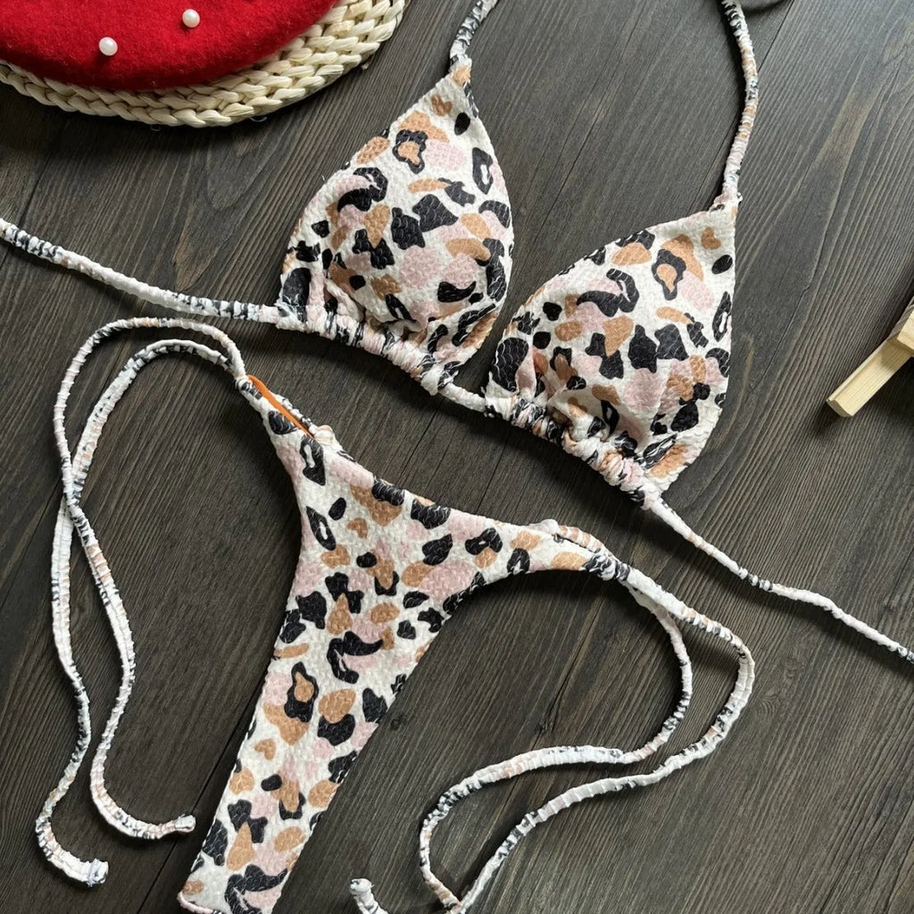 Women's printed bikini swimsuit with cotton lining on mannequin showing briefs style