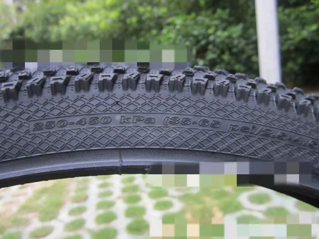 Ultralight puncture-resistant mountain bike tyre showing tread pattern, available in multiple wheel sizes.