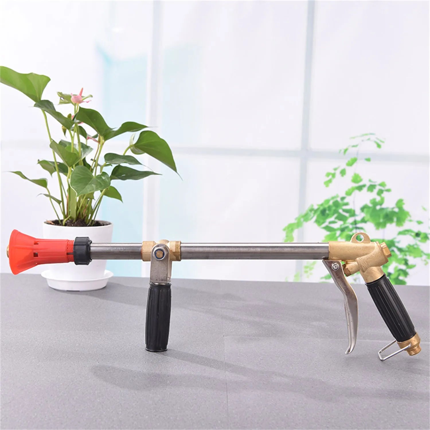 Adjustable agricultural spray gun for pesticide spraying with submachine gun style design