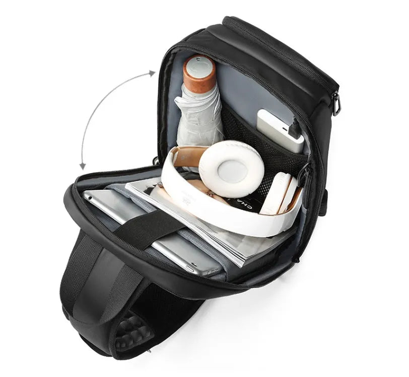 Black PVC outdoor leisure shoulder bag with air cushion strap and internal organisers