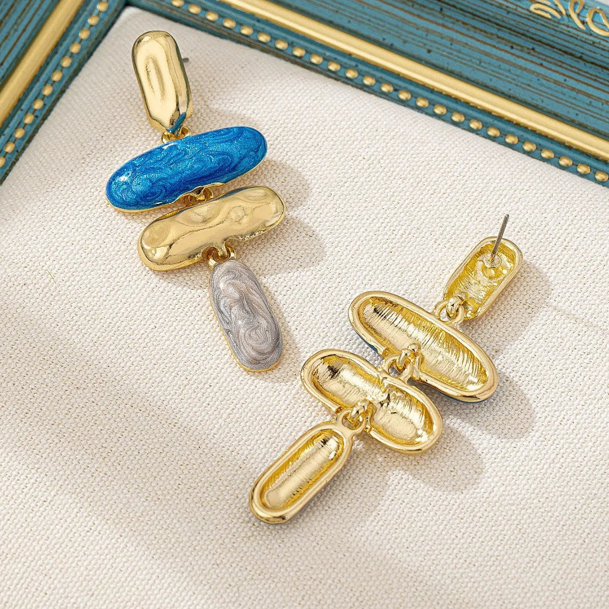 Geometric stud earrings with multicolour electroplating on zinc alloy